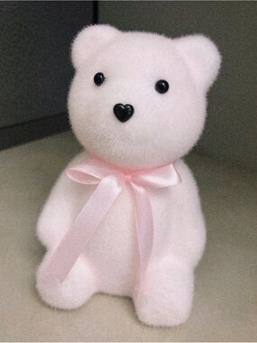 Fuzzy pink bear desk decor